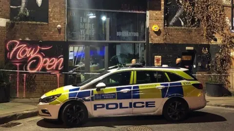 PA Media Police car outside Hackney Wick bar