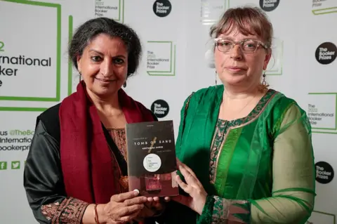 Getty Images Geetanjali Shree and Daisy Rockwell attend The 2022 International Booker Prize Winner Ceremony at One Marylebone on May 26, 2022 in London, England