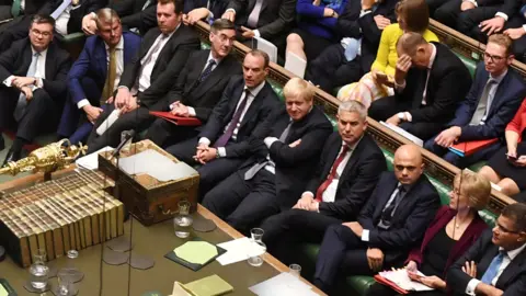 UK PARLIAMENT The Conservative front bench during Saturday's debate