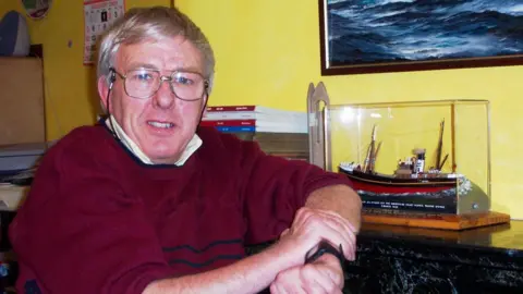 Alec Gill Alec Gill in his office 2003