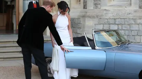 AFP/Getty Images The Duke and Duchess of Sussex about to drive to their evening wedding reception at Frogmore House