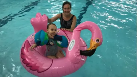 Friends of Jubilee Pool A young child on an inflatable with her mother