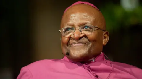 Getty Images Archbishop Desmond Tutu speaking at a book launch