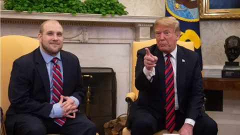 AFP US President Donald Trump with Joshua Holt in the White House. 26 May 2018