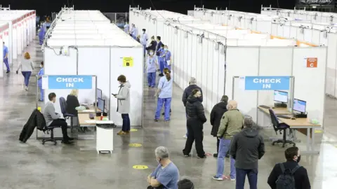 PACEMAKER People at the vaccination centre at the SSE in Belfast