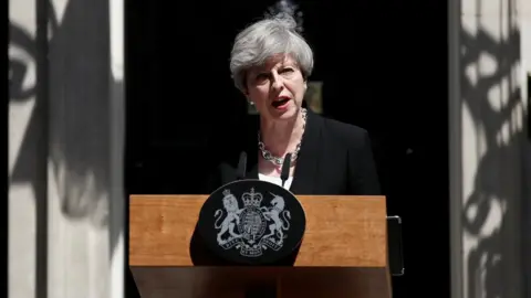 Reuters Theresa May outside Downing Street