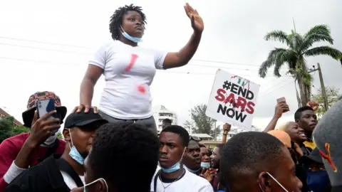 AFP Rinu Oduala in the midst of a crowd