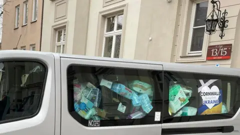 Darren's Cars Taxi full of donations