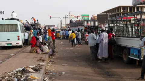 Reuters People gather in Khartoum on Wednesday