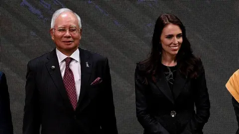 AFP Malaysian PM Najib Razak and New Zealand PM Jacinda Ardern