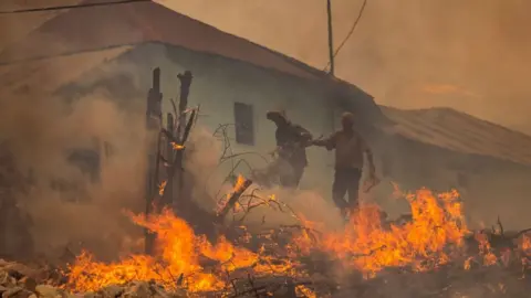 AFP Raging fire and smoke