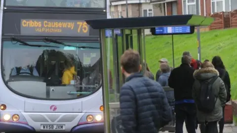 LDRS Cribbs Causeway 75 bus approaching bus stop