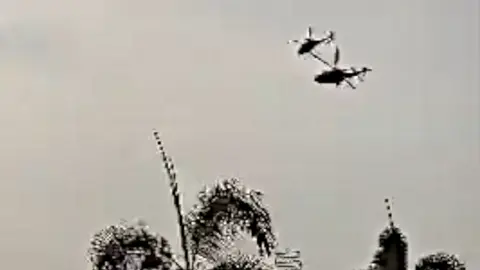 Helicopters on verge of collision