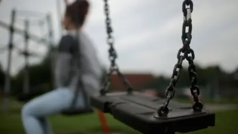 Getty Images A child on a swing