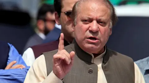 Reuters Pakistan's Prime Minister Nawaz Sharif gestures as he speaks to media after appearing before a Joint Investigation Team (JIT) in Islamabad, Pakistan 15 June 2017