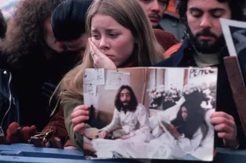 Getty Images Lennon mourners