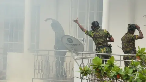 AFP A bomb goes off as Special Task Force personnel raid a home near Dematagoda in Colombo