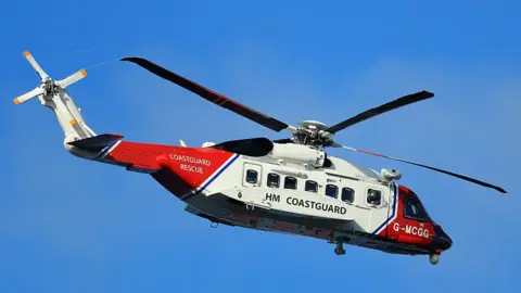 Getty Images A coastguard helicopter - library pic