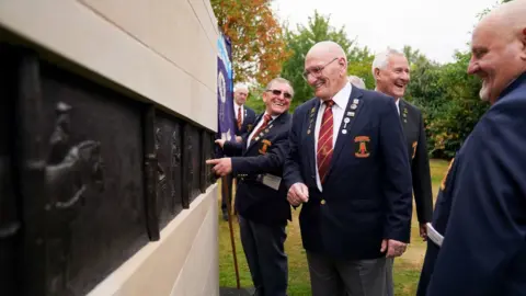 PA Media Members of the Lea Hall Brereton Collieries Memorial Society