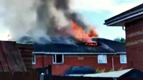 The Swindonian House on fire