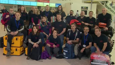 BBC medics and their luggage in the airport