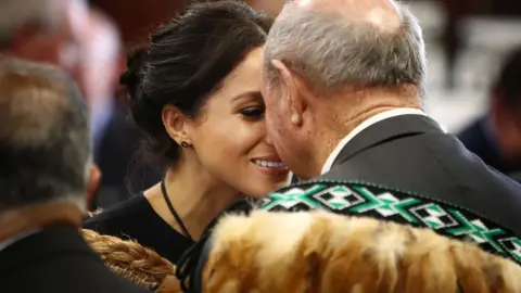 Getty Images Meghan, Duchess of Sussex receives a "hongi", or traditional Maori greeting on a visit to Te Papaiouru marae in Rotorua on October 31, 2018