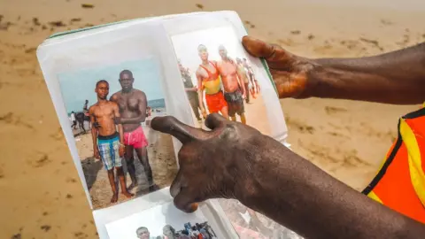 BBC Lagos lifeguard Samuel Omohon shows album he keeps, Nigeria