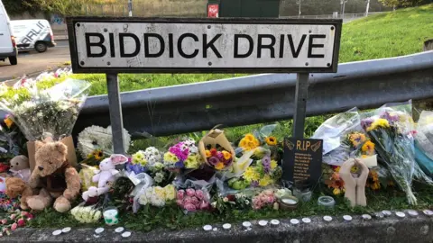 BBC Flowers lay next to Biddick Drive sign