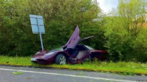 Rex Features Rowan Atkinson's car crashed