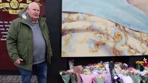 Stuart Finlay at Shankill Road Queen mural