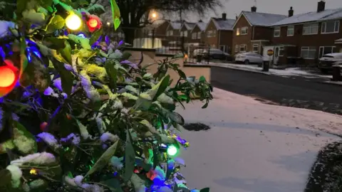 BBC Weather Watchers/@NNweather Snow in Northampton and Christmas lights