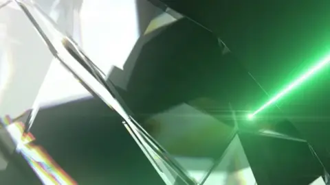 opsydia Diamond and laser beam graphic