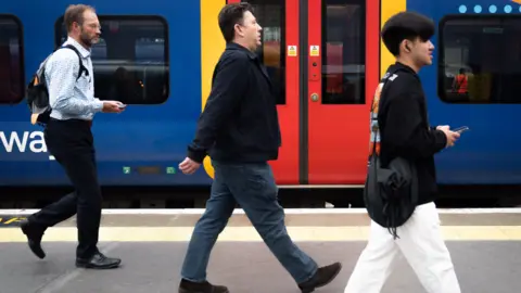 PA Media Train passengers on platform