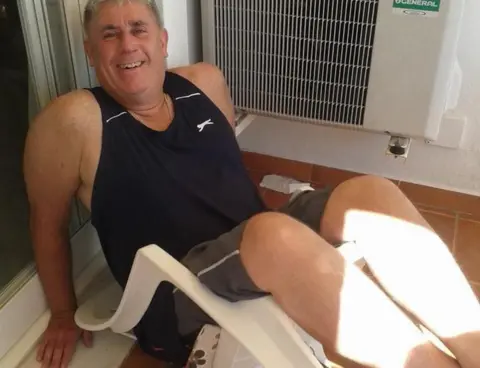 Brownlee Family Ali in collapsed chair