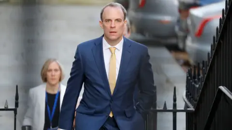 Getty Images Foreign Secretary Dominic Raab arrives at Downing street in central London to chair the Government"s Covid-19 daily briefing on April 7, 2020