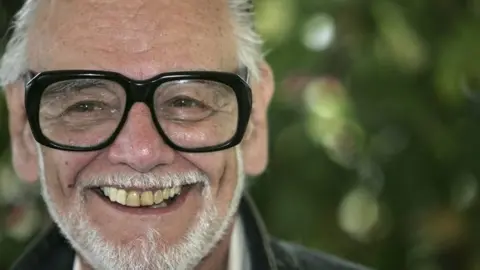 Getty Images Director George A Romero attends a photocall promoting the film Land of the Dead at the Martinez Poolside during the 58th International Cannes Film Festival May 14, 2005 in Cannes, France