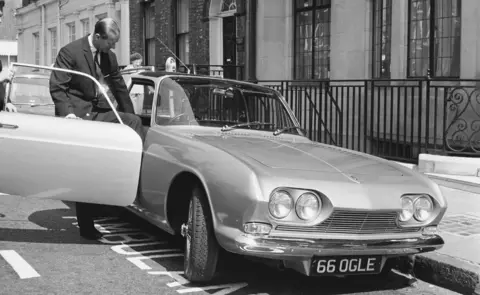 Getty Images Duke of Edinburgh with his new Reliant Scimitar, during a visit to see Princess Anne at King Edward VII's Hospital in London (April 1966)