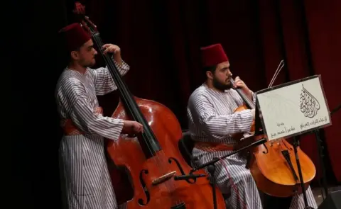 EPA Members of the group "Chouyoukh Salatin Tarab" from Syria perform during the Festival de La Medina at the Municipal Theater in Tunis, Tunisia, 22 May 2018.