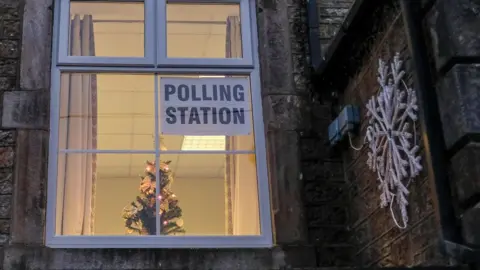 Getty Images Christmas tree at a polling station