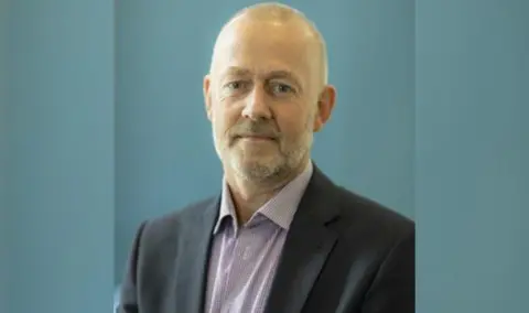 Macclesfield East Councillor Mick Warren