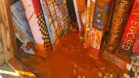 BBC Books covered in beans