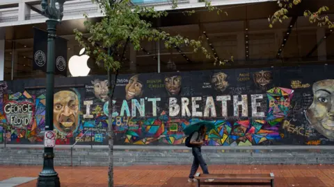 Getty Images A mural reading "I can't breathe" with images of George Floyd