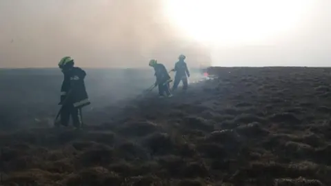 DEVON AND SOMERSET FIRE AND RESCUE SERVICE Crews tackling fire