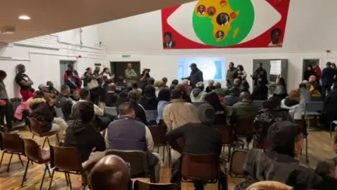 Community meeting at the Malcolm X centre