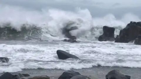 Jacqui Wright Rolling waves at Ballycastle in County Antrim