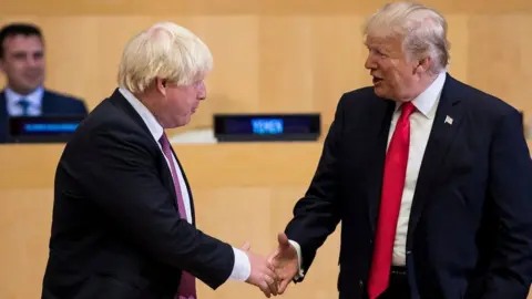 Getty Images Boris Johnson and Donald Trump shake hands