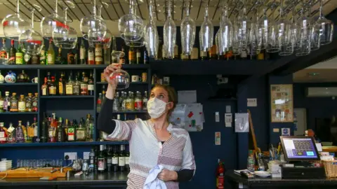 Getty Images Woman in pub