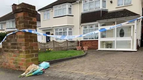 PA Media Flowers at scene