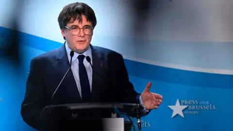 JOHN THYS/AFP Catalonia's exiled former leader and MEP Carles Puigdemont, founder of the party Junts per Catalunya ("Together for Catalonia") Carles Puigdemont gives a press conference