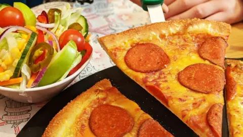 Pizza Hut Restaurants  Pizza Hut's vegan "pepperoni" pizza